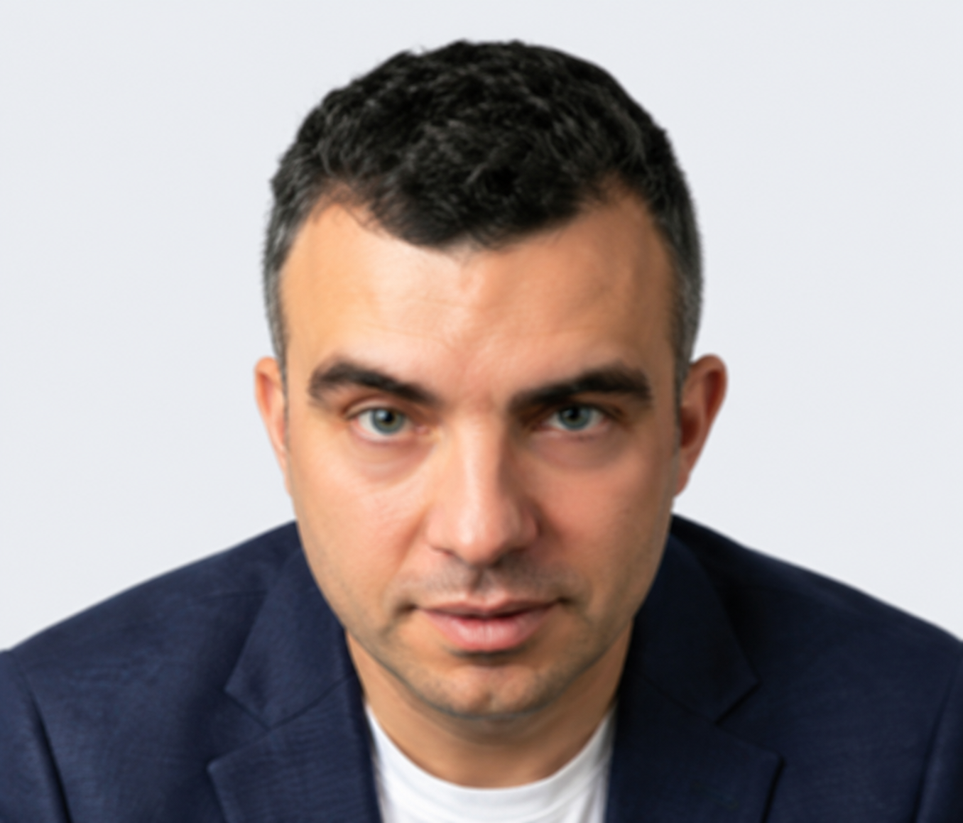 Portrait of Tolga EKREN